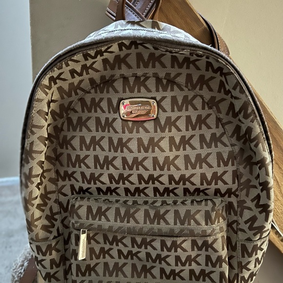 Michael Kors Handbags - Michael Kors Brown Logo Backpack GUC